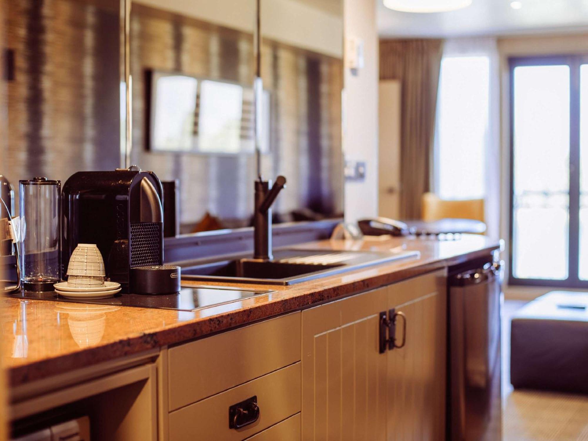 Hotel St Moritz Queenstown - Mgallery By Sofitel Extérieur photo A Nespresso machine in a hotel room